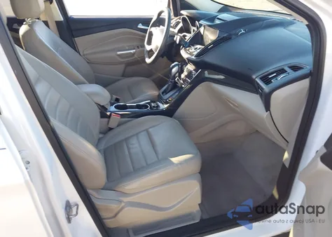 2014 Ford Escape Titanium z USA, uszkodzony, nr VIN 1FMCU0JX6EUC27833